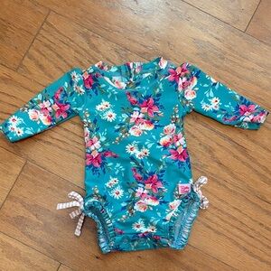 Ruffle Butts Teal Floral Baby Sun Protection One-Piece Zip-up Swimsuit